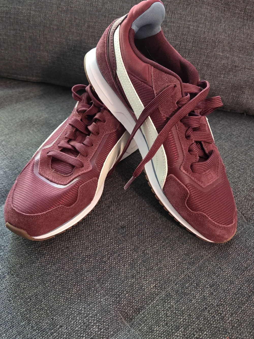 Puma Women's Burgundy Athletic Sneakers with Light Blue Heel Accent
